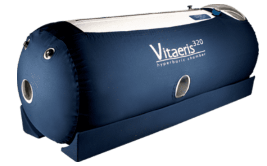 The Blue Vitaeris 320 hyperbaric chamber offers Mild Hyperbaric Oxygen Therapy in a sleek cylindrical shape, complete with multiple windows and a zippered entry for easy access.